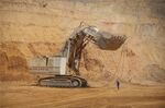 A mining excavator during the extraction of ore from a copper and cobalt mine in the Democratic Republic of Congo.