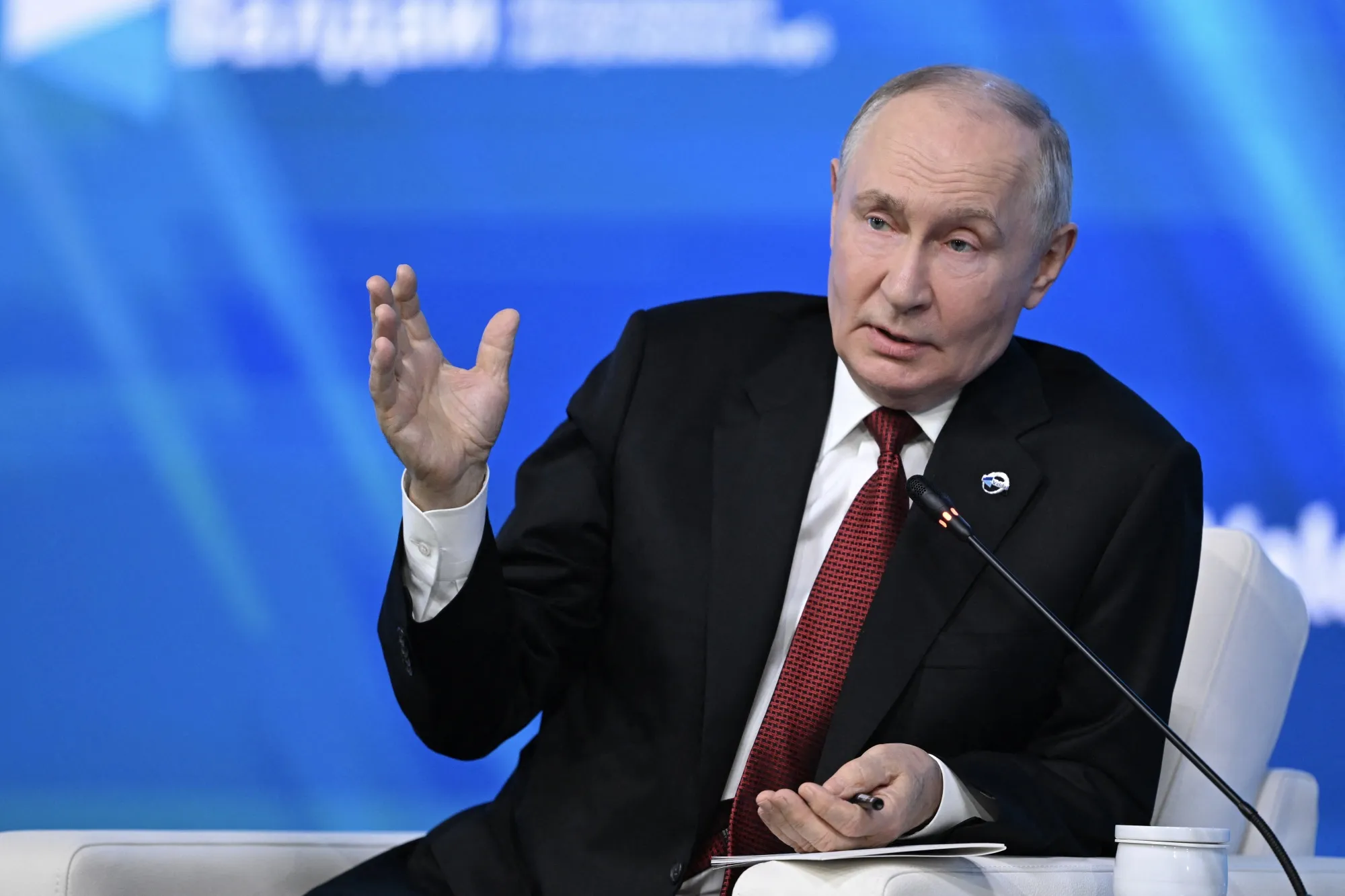Putin warns West Russia is ready to use every weapon to protect Kaliningrad; NATO condemns 'irresponsible nuclear rhetoric' as tensions rise