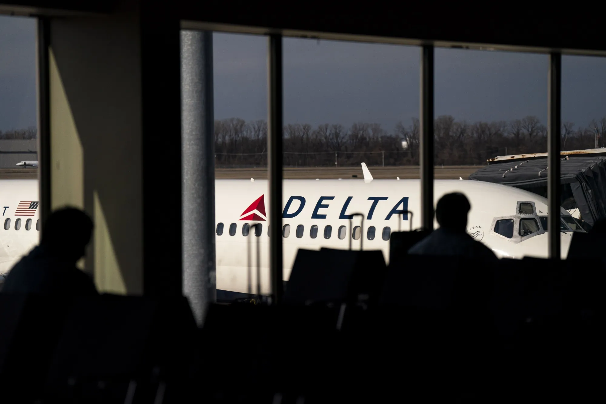 A Delta Air Lines plane at a gate at the Bill and Hillary Clinton National Airport&nbsp;in Little Rock, Arkansas.