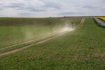 A tractor kicks up dust at a farm during drought conditions, in Aisne, France, in April.