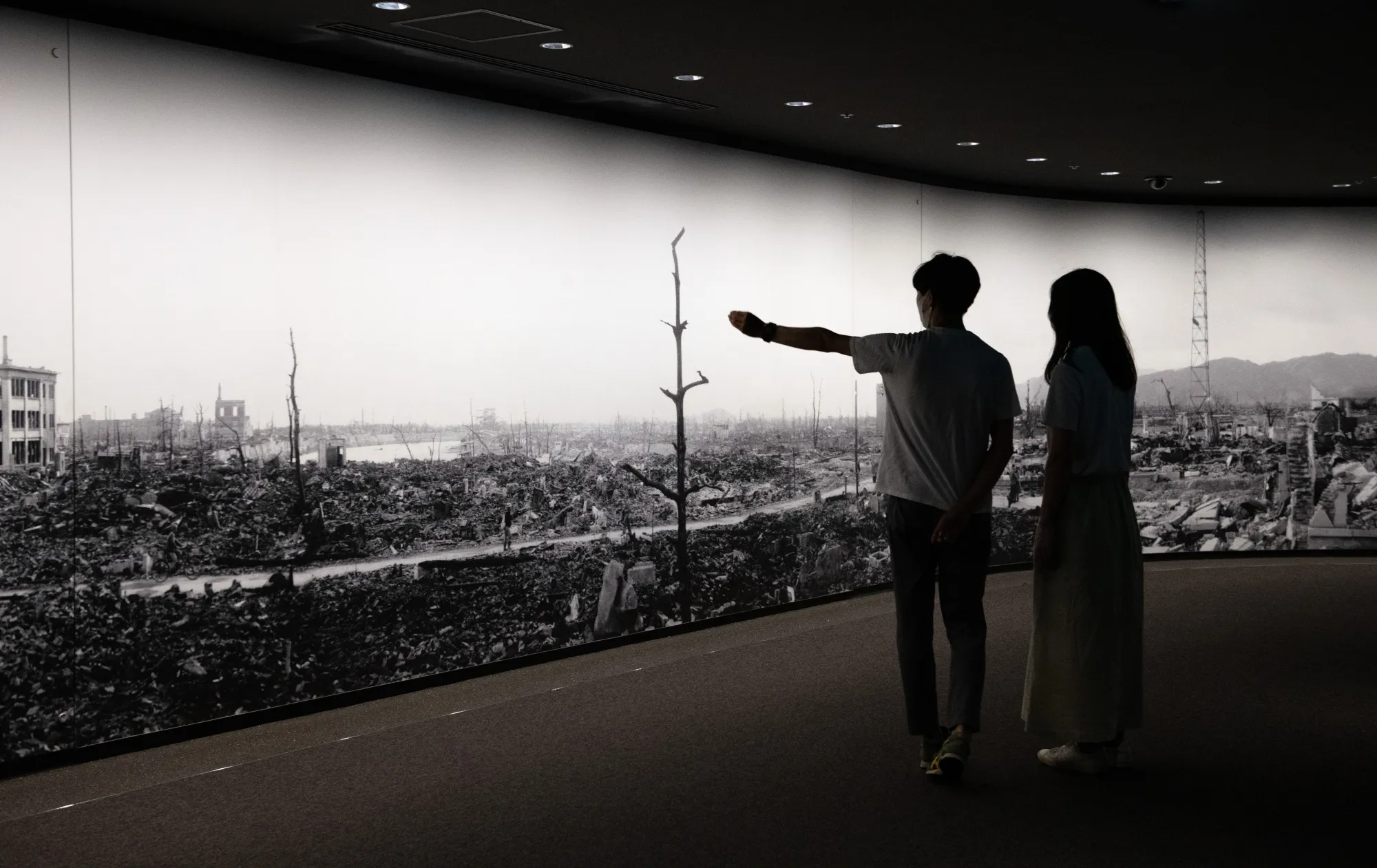 Visitors to Hiroshima Peace Memorial Museum view a panoramic photograph of the aftermath of the atomic bomb attack on Hiroshima in 2020.&nbsp;
