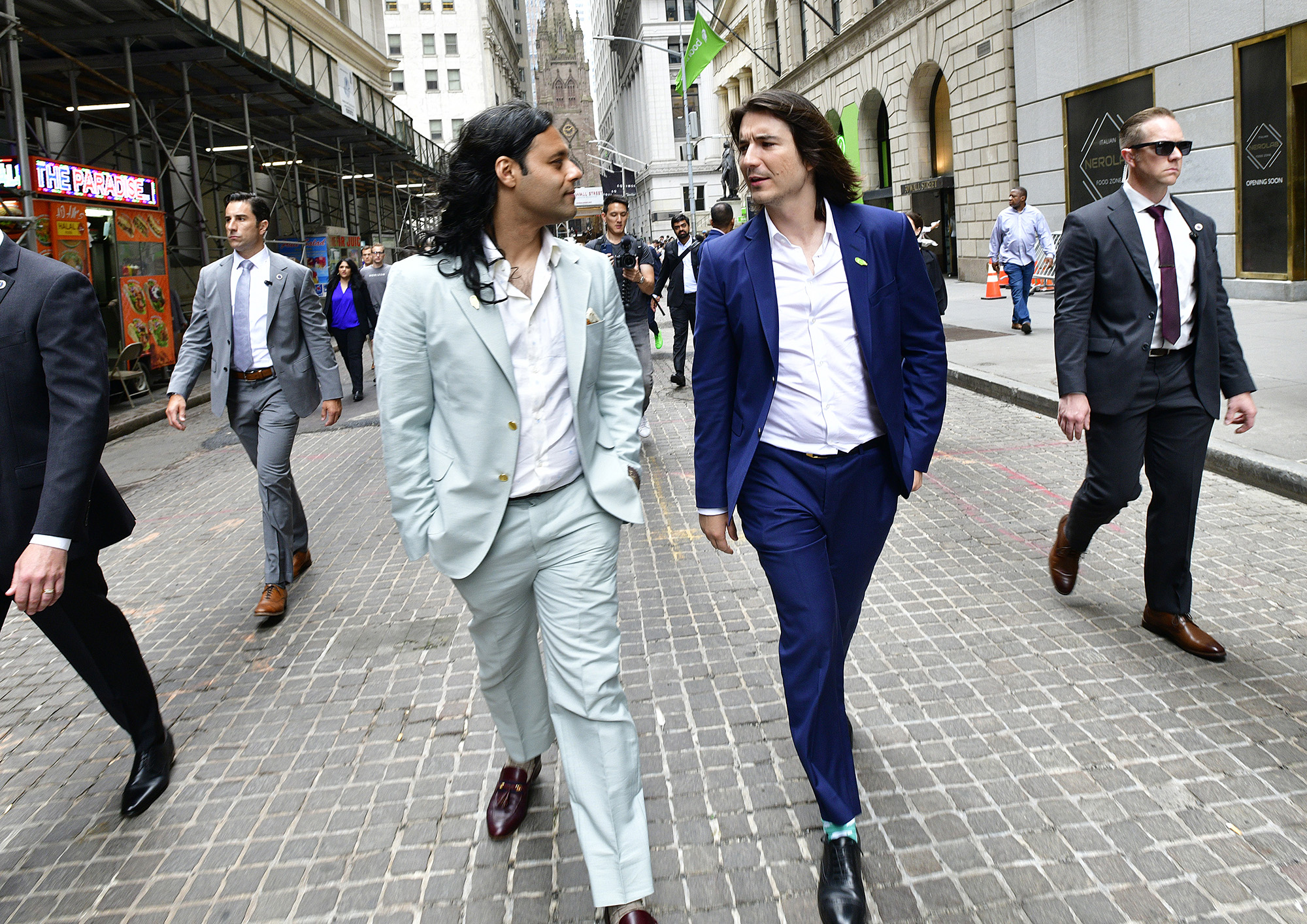 Baiju Bhatt and Vlad Tenev on Wall Street during Robinhood’s IPO listing day in New York in July 2021.
