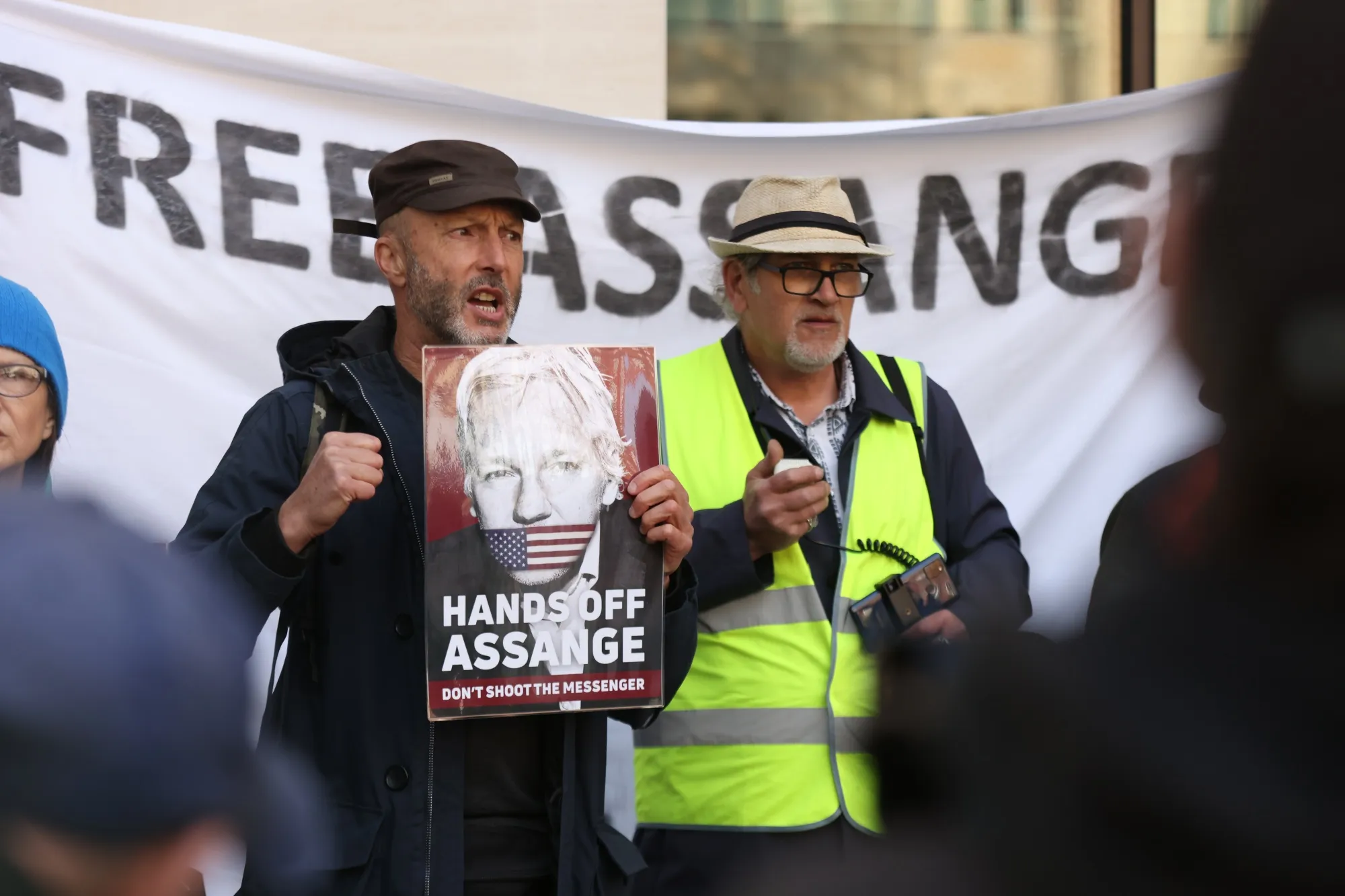 Supporters of Wikileaks founder Julian Assange protest outside Westminster Magistrates' Court in London, during his continuing extradition hearing on April 20.