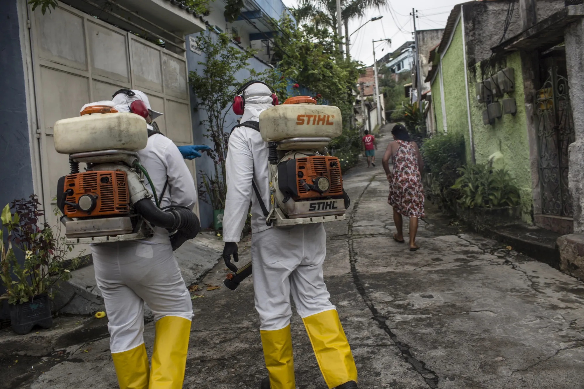 Workers disinfect a street surrounding a hospital in Niteroi, Rio de Janeiro state, Brazil, on March&nbsp;30.