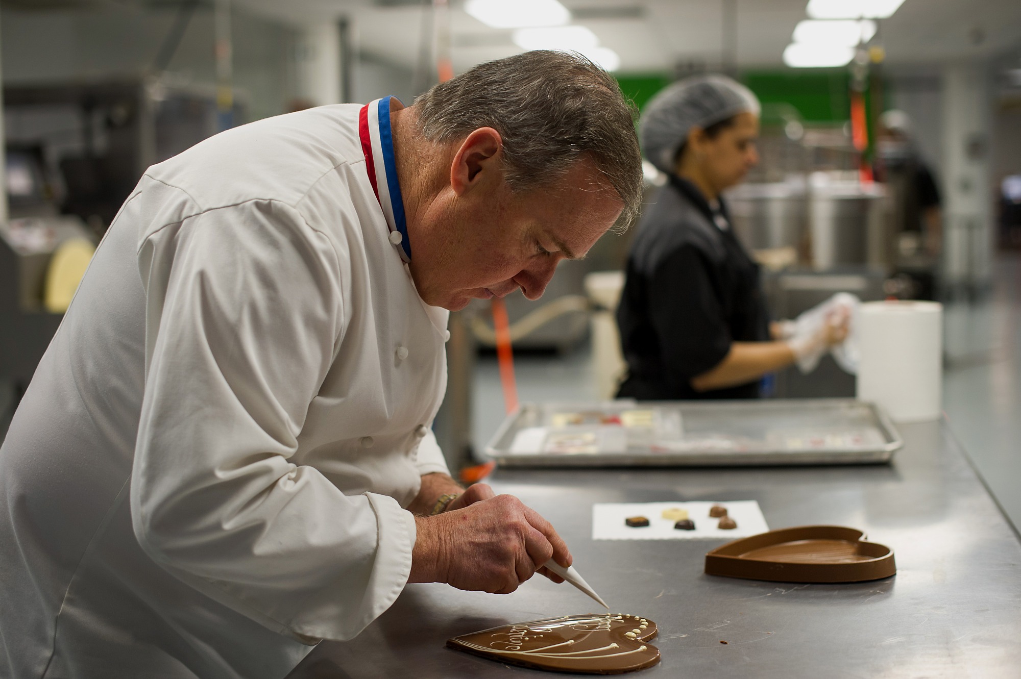 Master pastry chef Jacques Torres makes Valentine's Day chocolates at his factory in the Brooklyn borough of New York, U.S., on Thursday, Feb. 6, 2014.