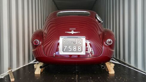 Specialty shippers will use soft straps (rather than chains or ropes, which can damage paint) for transporting precious finds such as this Ferrari 212.