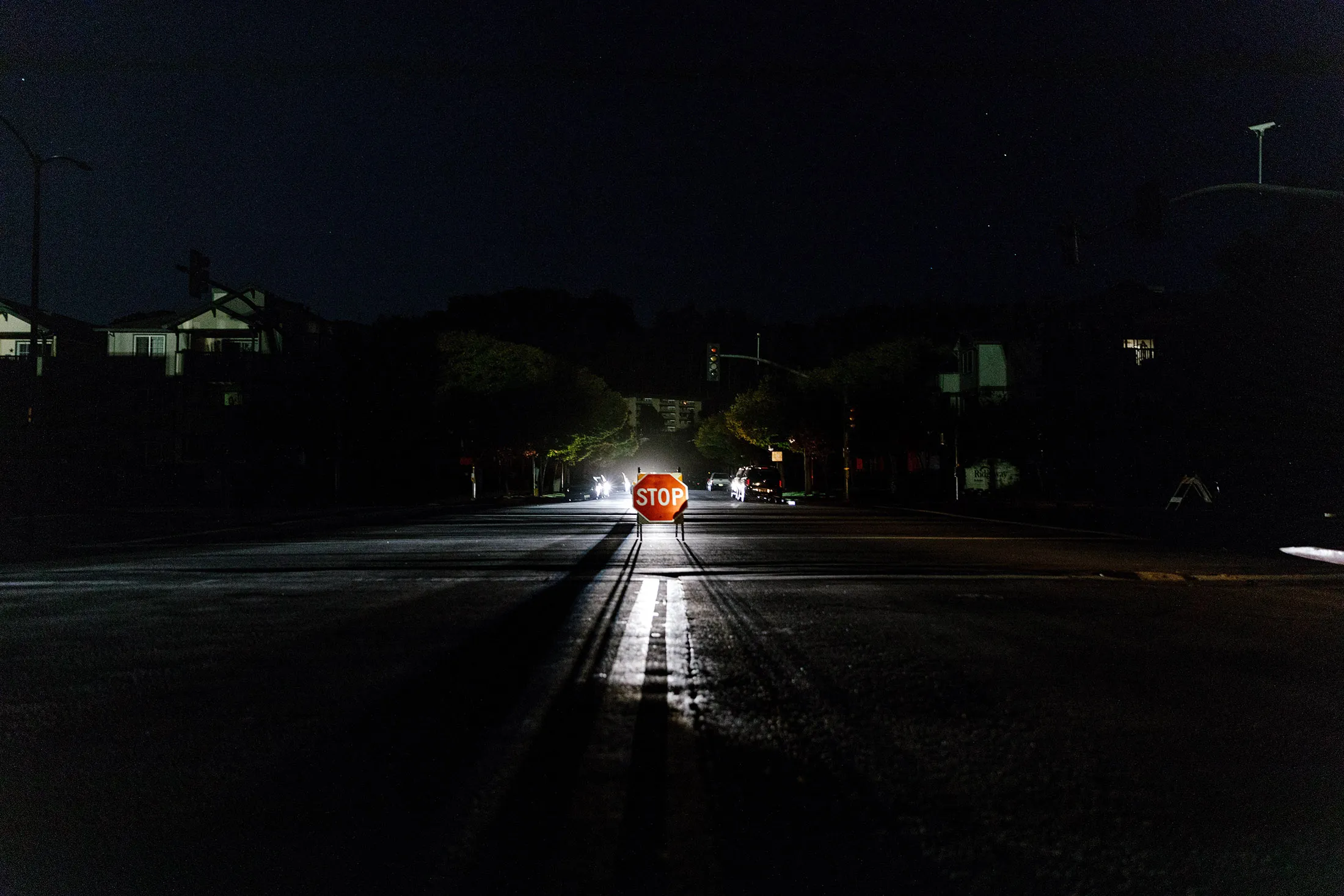 A stop sign in the middle of an intersection during a power outage in Marin City, California on Oct. 9, 2019.