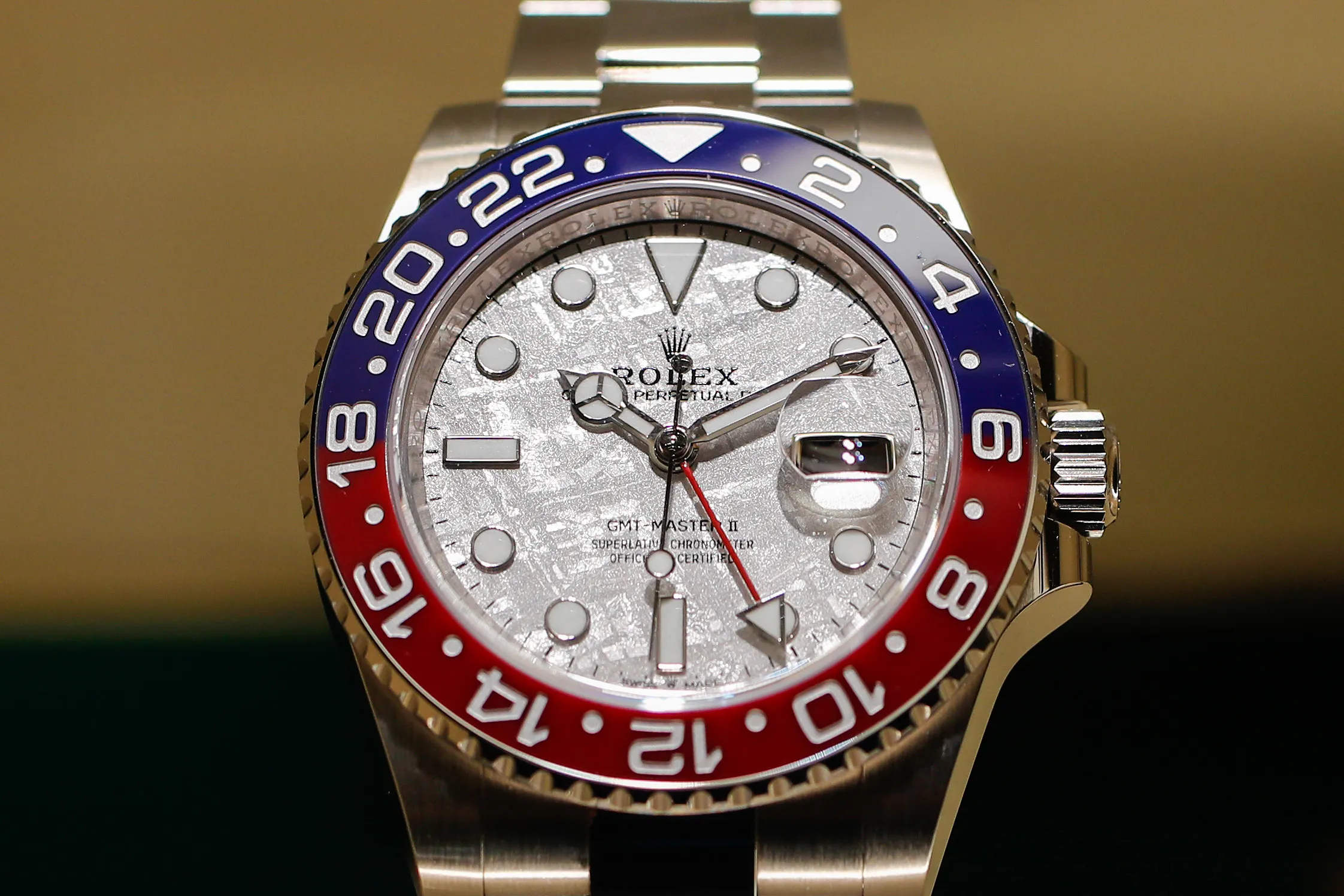 A GMT-Master II with a meteorite dial luxury wristwatch, produced by Rolex SA.