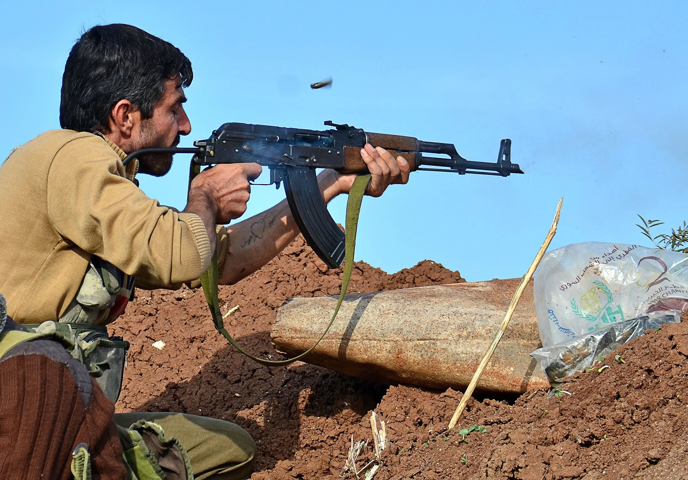 Syrian opposition forces during clashes with IS militants near Aleppo, Syria on Nov. 05, 2015.
