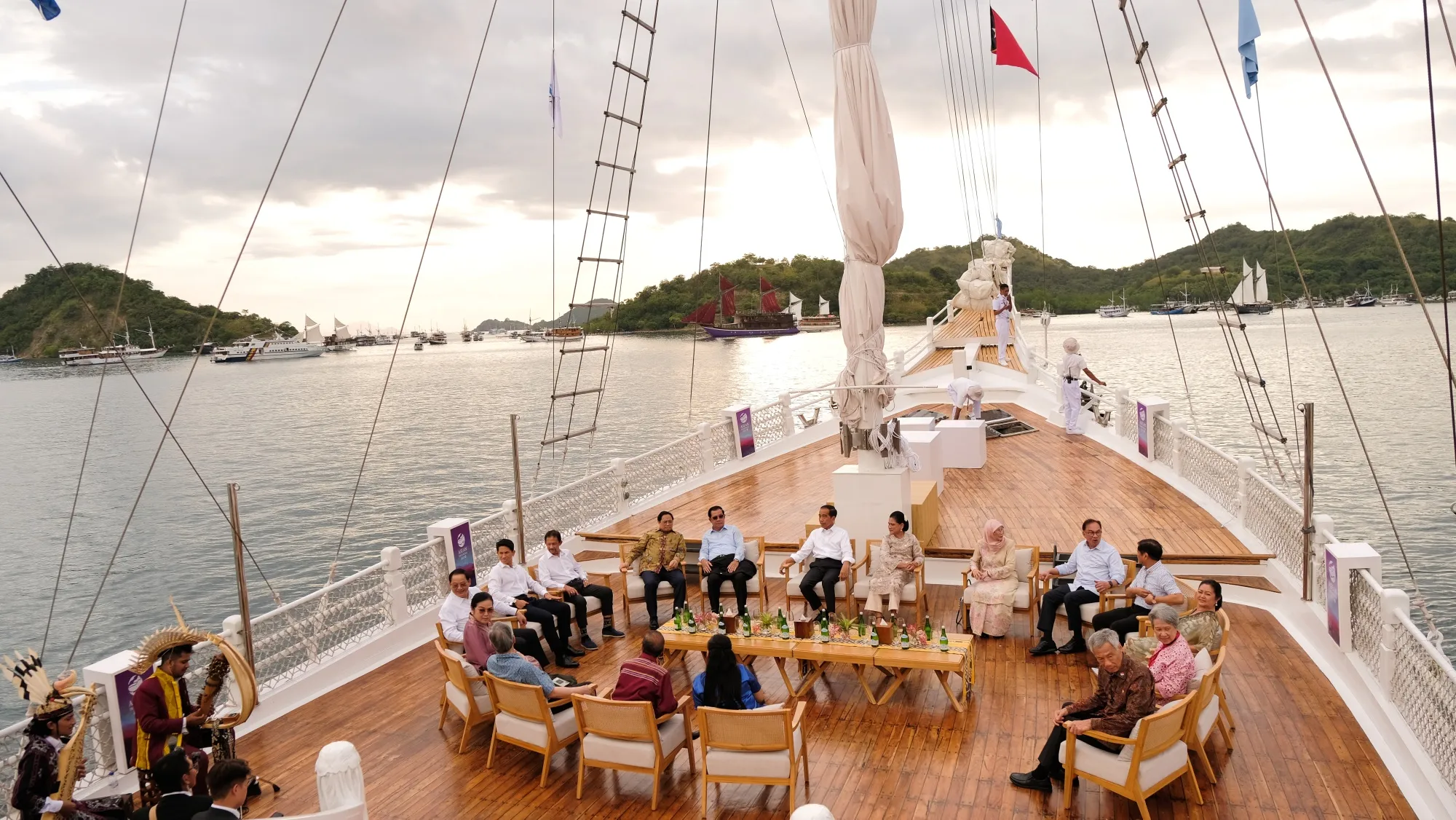 Joko Widodo and other ASEAN leaders sit on the deck of a traditional pinisi ship during the ASEAN Summit in Labuan Bajo, on May 10.