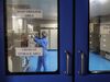 An employee in protective clothing works inside a deep freezer area of the research and development center in Bengaluru, India.