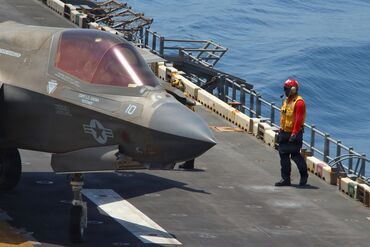 An F-35 fighter jet prepares to take off from USS Tripoli in April.