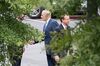 White House Chief of Staff John Kelly (C) shakes hands with an unidentified man as Assistant Attorney General Rod Rosenstein (R) walks away after a meeting at the White House in Washington, DC, on September 24, 2018.