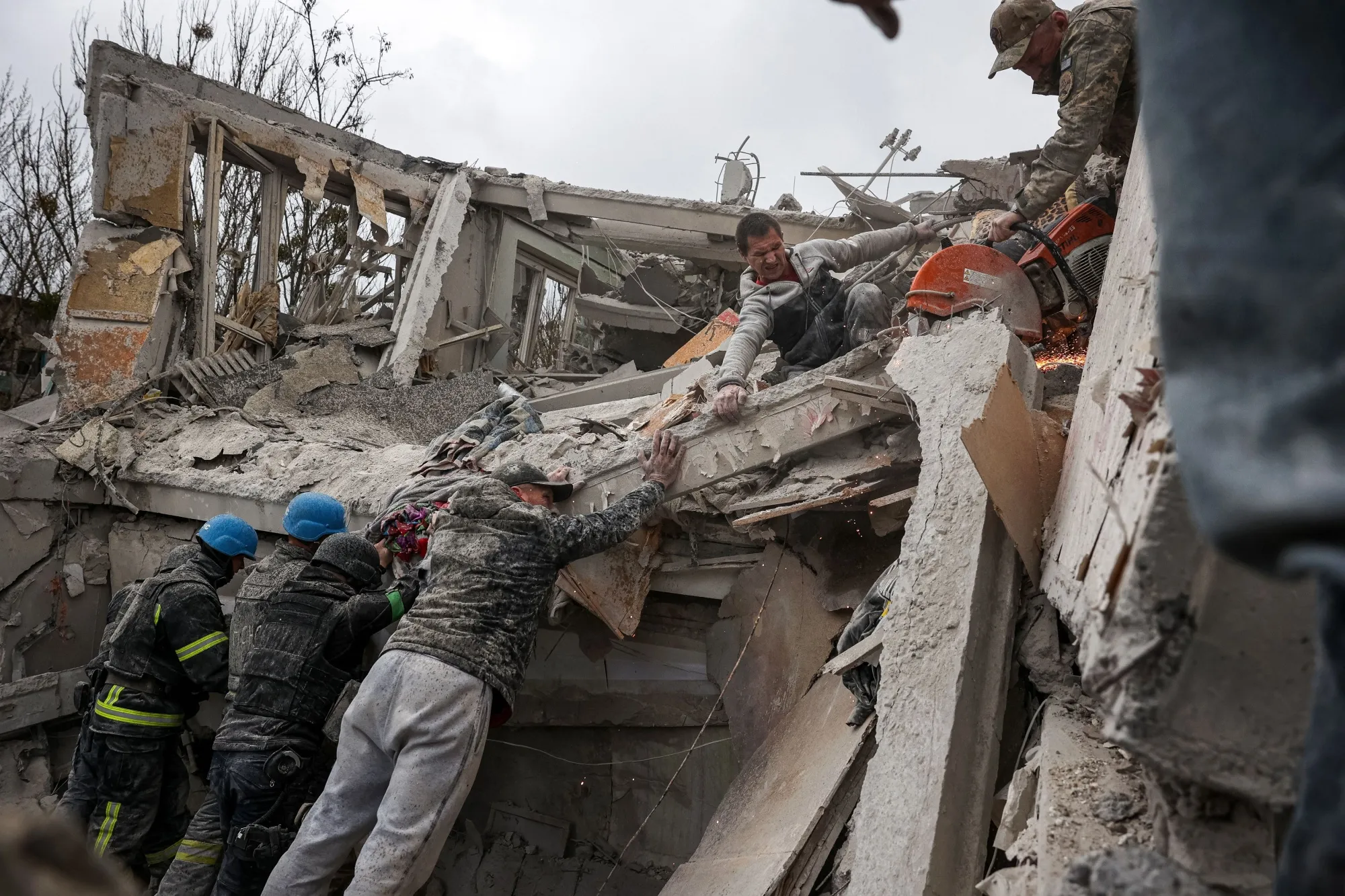 Rescuers look for survivors after a sheling in Sloviansk, on April 14.