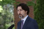 Justin Trudeau speaks during a news conference outside his Ottawa residence on May 27.
