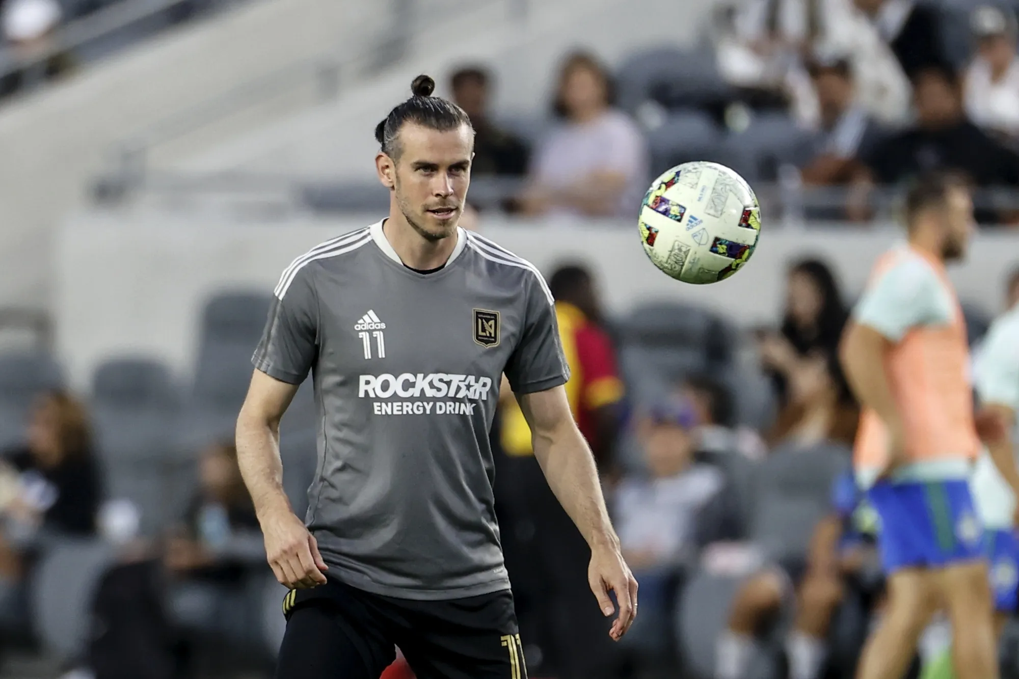 Los Angeles FC forward Gareth Bale warms up prior to the team's MLS soccer match against the Seattle Sounders on Friday, July 29, 2022, in Los Angeles. Gareth Bale feels fitter and happier since joining MLS team Los Angeles FC and is hoping that helps his performances for Wales going into the World Cup. Bale chose to move to the United States to get the most out of the final years of his career for club and country after some tough times at Real Madrid. (AP Photo/Ringo H.W. Chiu, File)