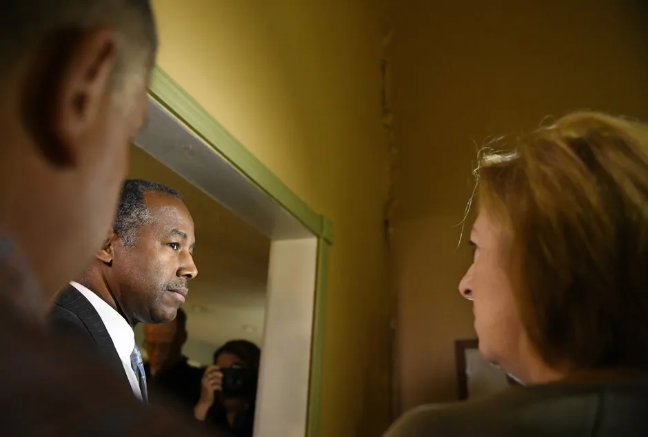 HUD Secretary Ben Carson tours a crumbling home in Connecticut in June.