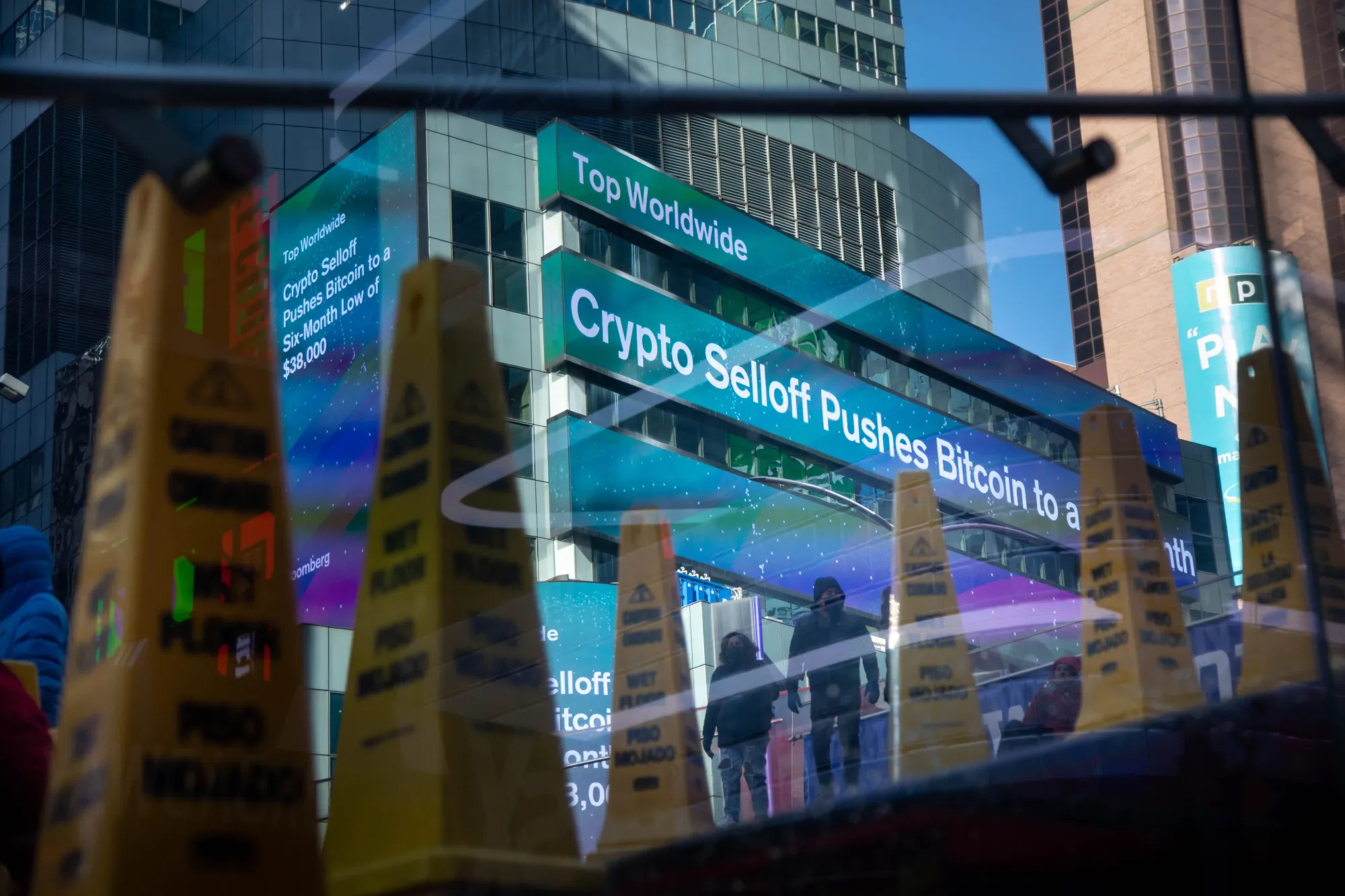 Monitors display financial news&nbsp;in New York on&nbsp;Jan. 21.&nbsp;