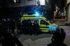 Paramedics and authority at the site of a bomb blast at the Mar Girgis Coptic Church north of Cairo, on April 9.