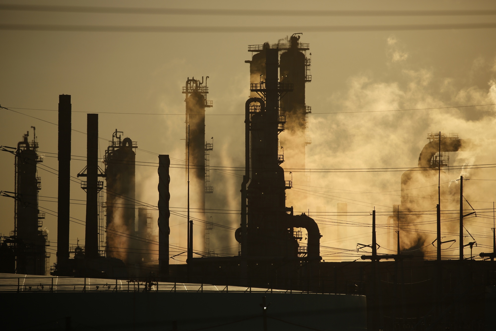 Emissions rise from a refinery in Norco, Louisiana, on June 12.