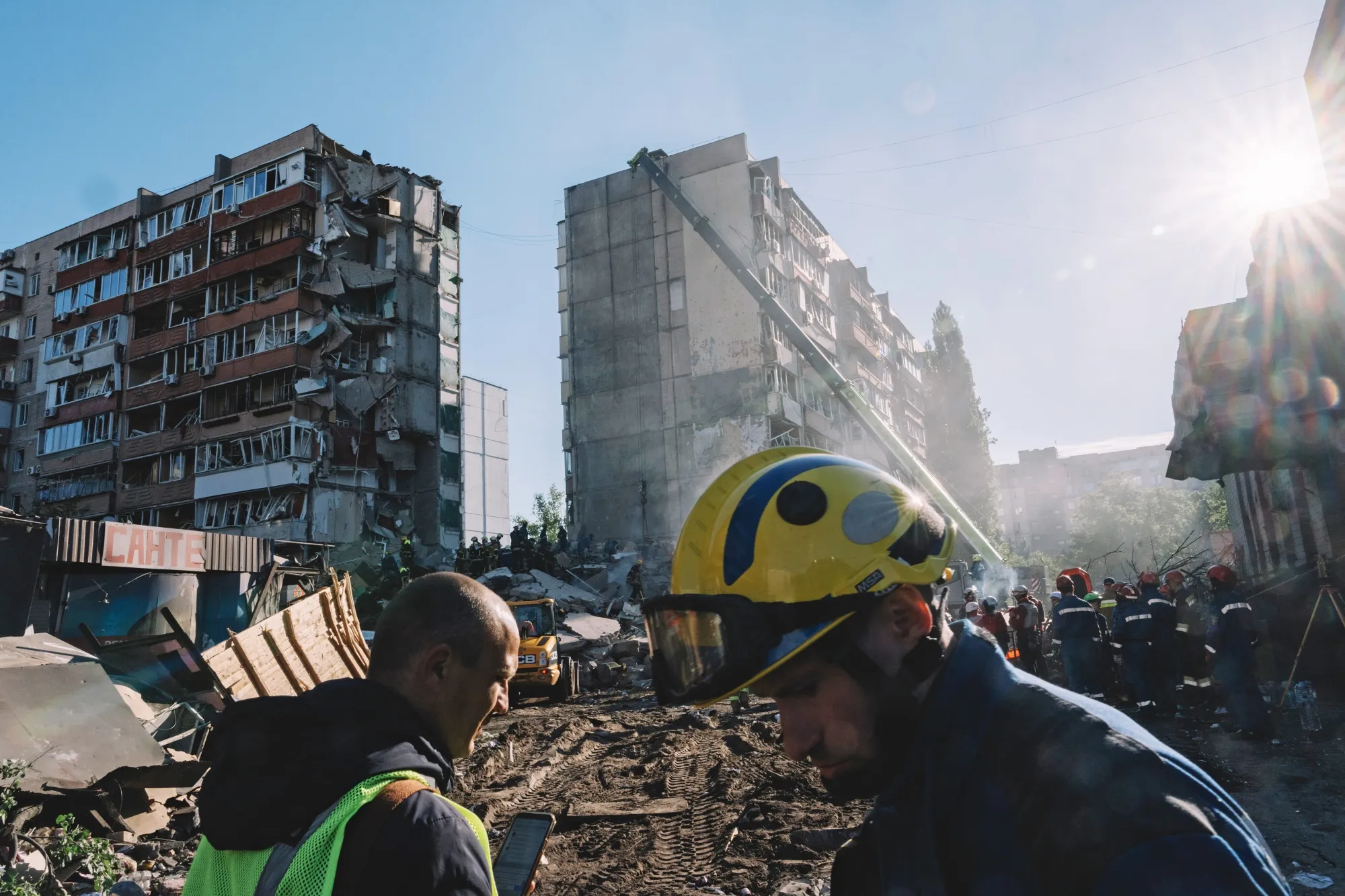 Emergency services work at the site of a Russian air strike in Kyiv, on May 14.