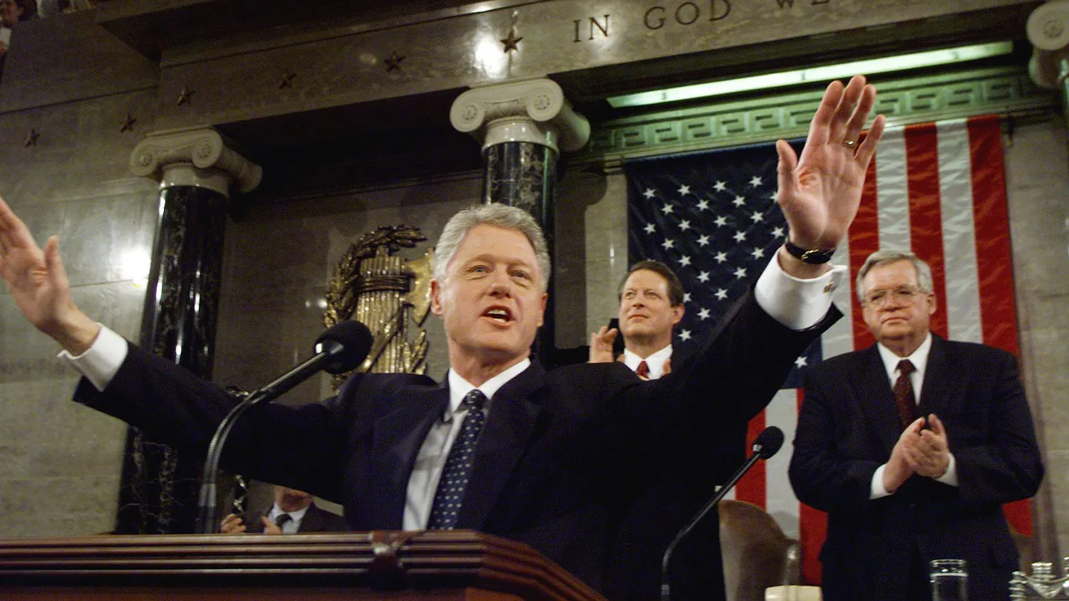 US President Bill Clinton accepts the applause of members of Congress late 19 January on his arrival at the podium for his State of the Union address on Capitol Hill in Washington, DC.
