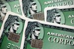 American Express Co. chip credit cards are arranged for a photograph in Washington, D.C., U.S., on Monday, Oct. 16, 2017. 