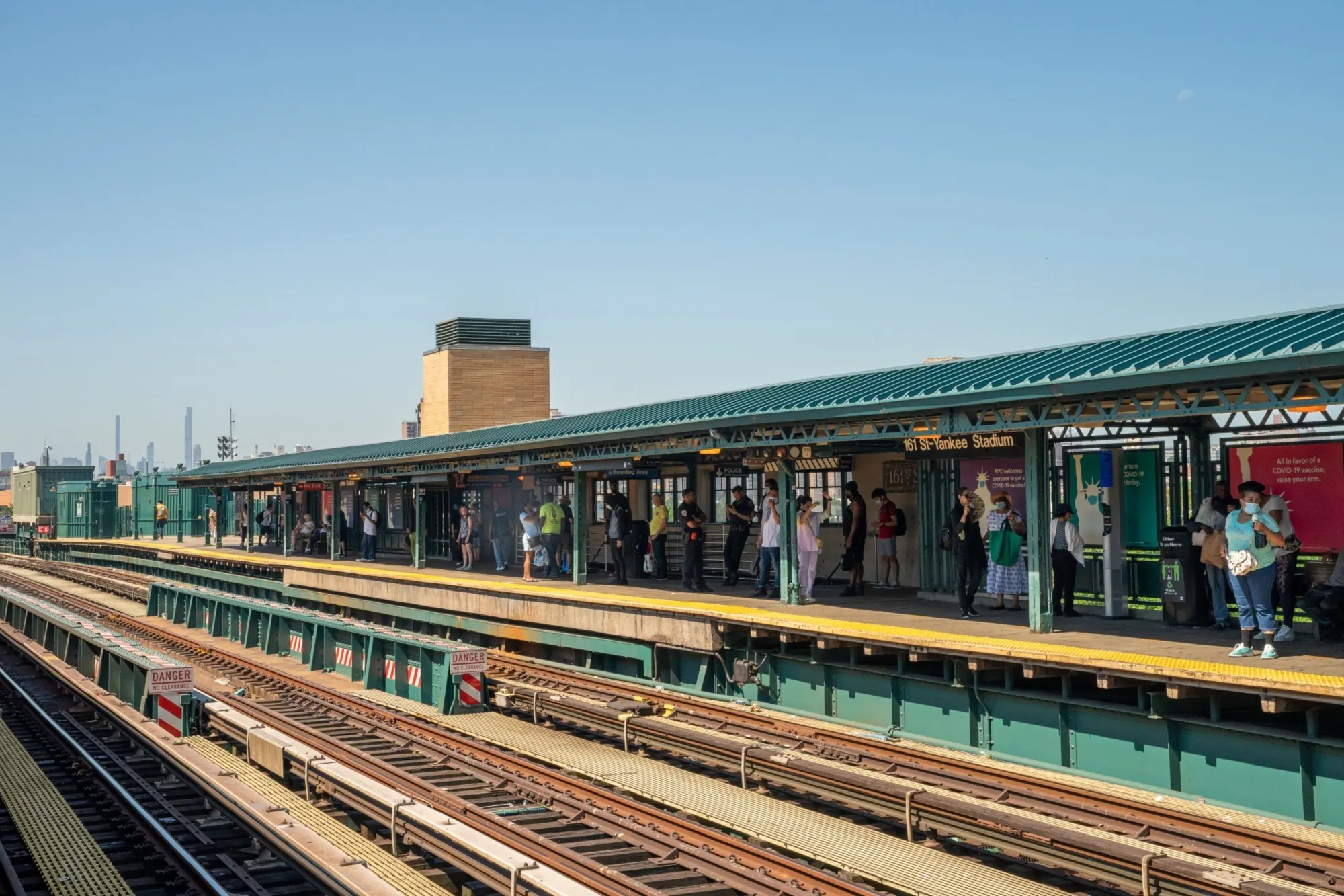 People wait for the subway during a heat wave in the Bronx borough of New York on June 30, 2021.&nbsp;