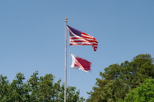 An American and company flag fly outside the Goex Industries plant.