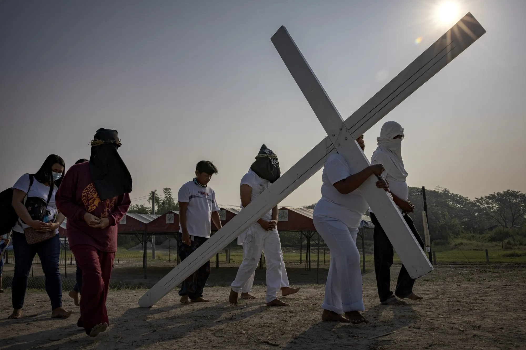 Penitents reenact the Passion of Christ in San Fernando, Pampanga province, on April 6.
