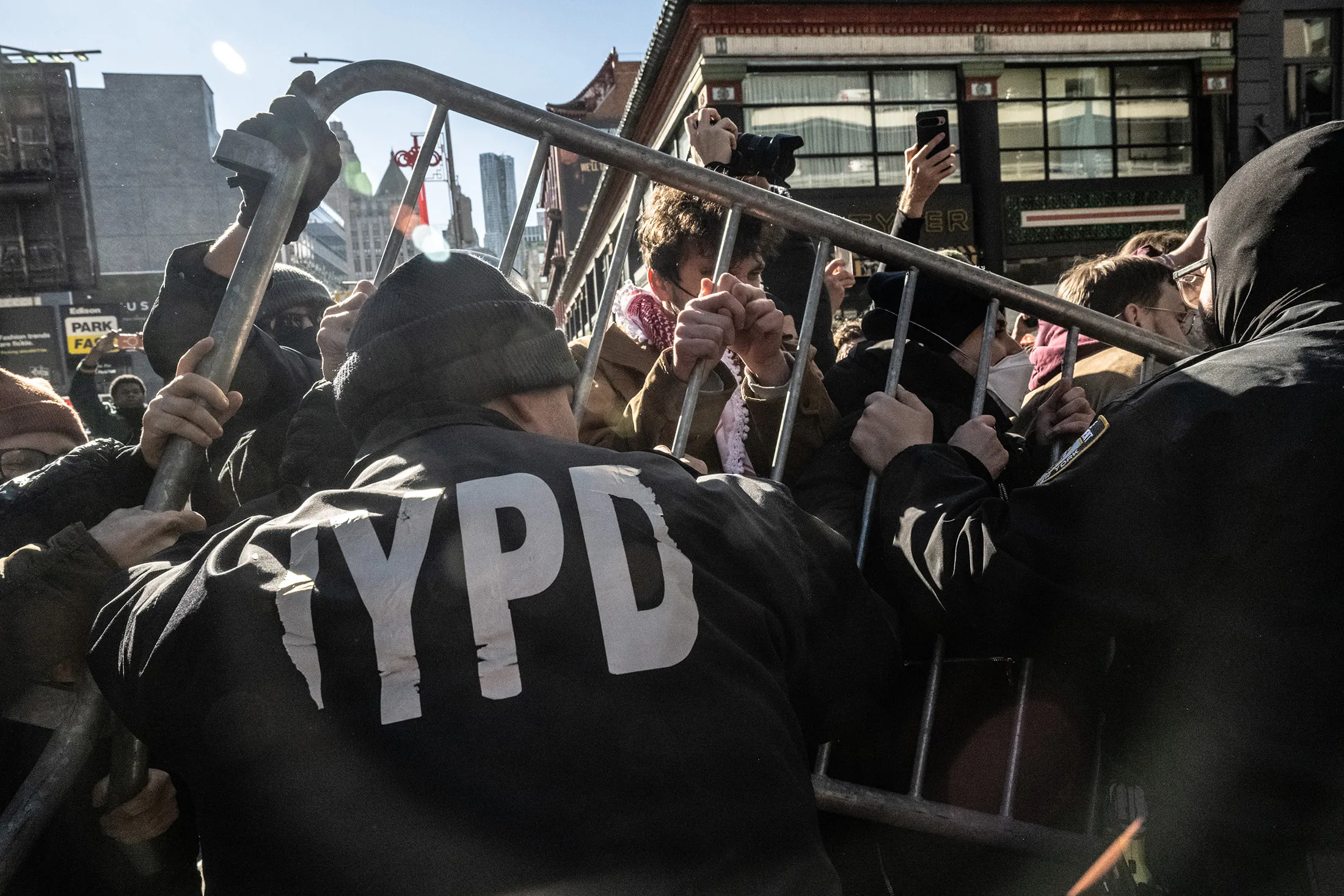 Demonstrators clash with NYPD officers&nbsp;while protesting Immigration and Customs Enforcement on Canal Street in New York on Nov. 29.
