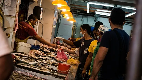 Back open for business in Malaysia, but at what cost?