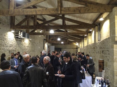Merchants crowd one of the many en primeur tastings held last year in Bordeaux for the 2014 vintage.
