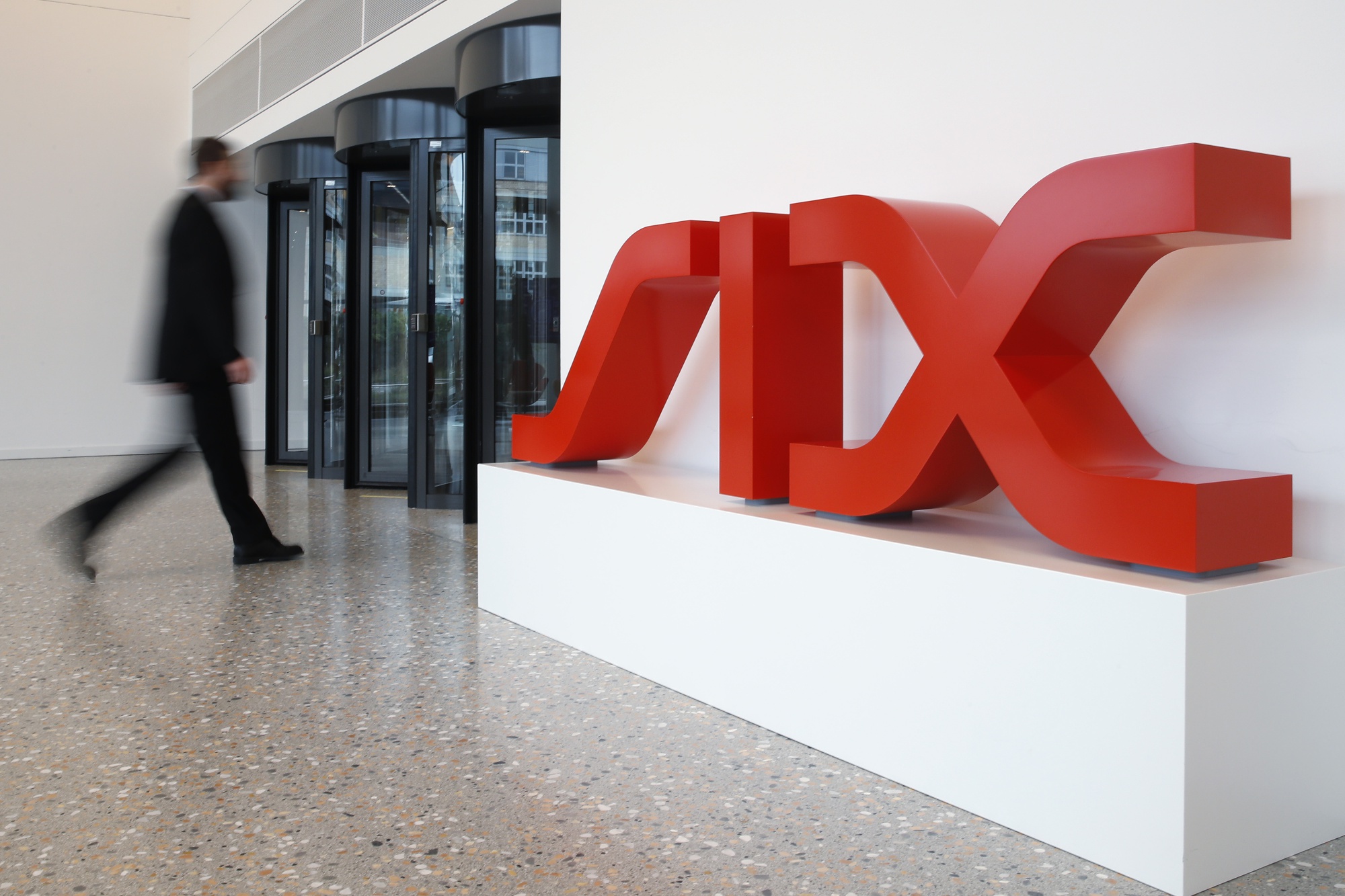 A SIX logo sits in the entrance hall of the Six Swiss Exchange AG in Zurich.