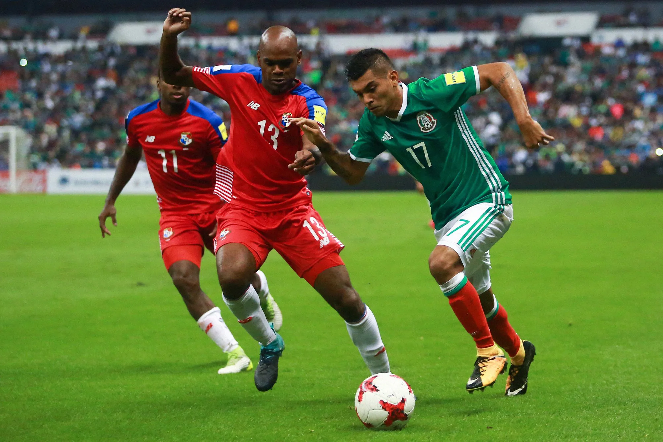 Jesus Corona (17) of Mexico battles for possession against Panama’s Adolfo Machado (13) during a FIFA World Cup qualifier&nbsp;in Mexico City.