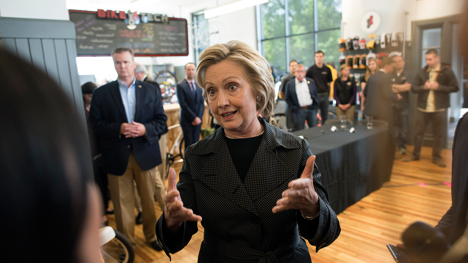 Hillary Clinton, former secretary of state and U.S. presidential candidate, speaks to reporters following a small business roundtable discussion at Bike Tech in Cedar Falls, Iowa, U.S., on Tuesday, May 19, 2015.

