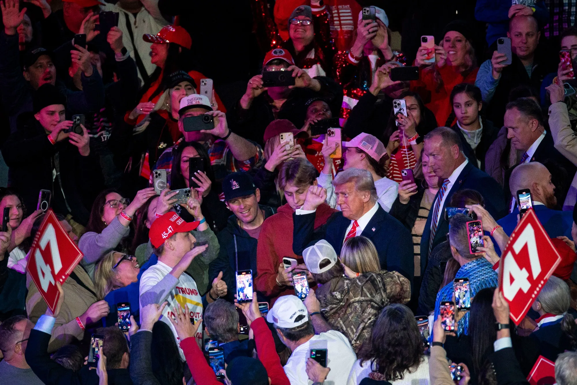 Donald Trump, center, arrives for a rally at Capital One Arena ahead of the 60th presidential inauguration in Washington, DC, on Jan. 19.