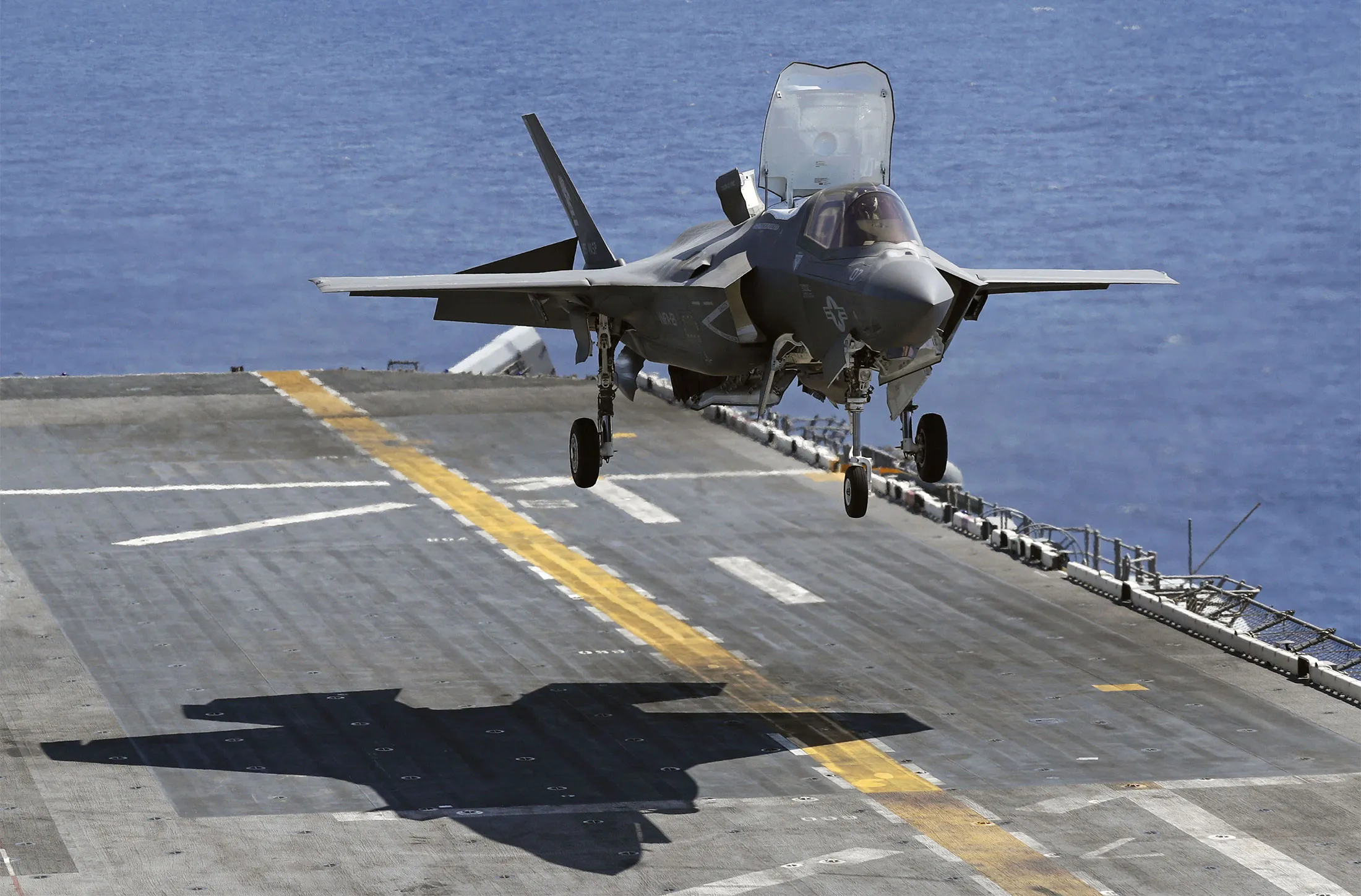 A U.S. military F-35B fighter jet conducts takeoff and landing exercises aboard the amphibious assault ship Wasp, which was deployed to the Sasebo base in southwestern Japan, in the western Pacific, on March 23, 2018.&nbsp;