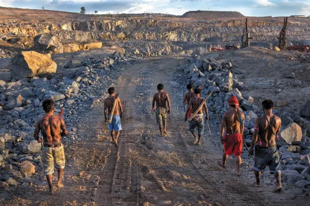 Indigenous Munduruku men at the quarry site for Belo Monte
