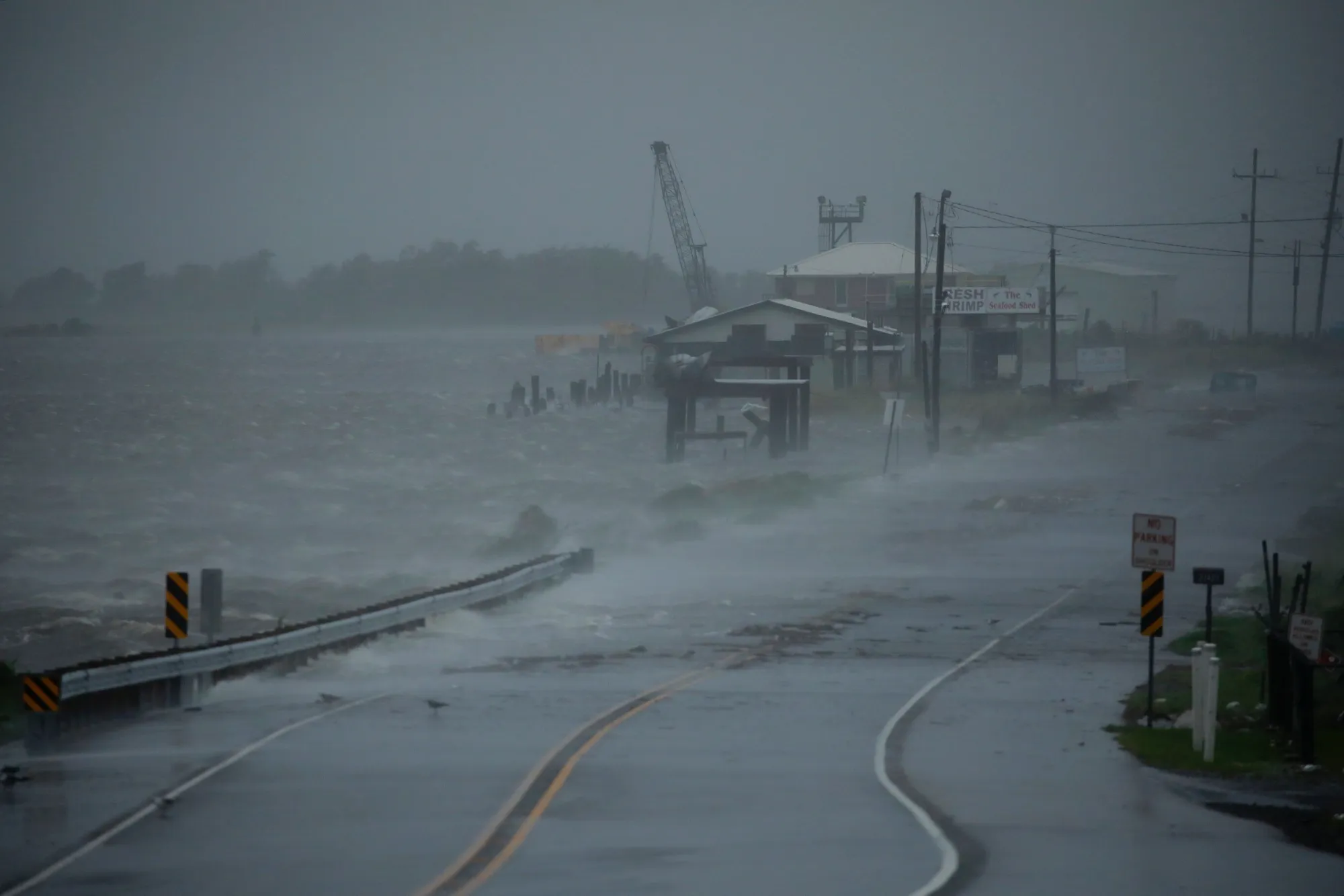 Storm surge begins to encroach on Louisiana Route 1 ahead of Hurricane Ida in Golden Meadow, Louisiana on Aug. 29.