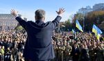 President Poroshenko gestures during a mass prayer for Ukraine.