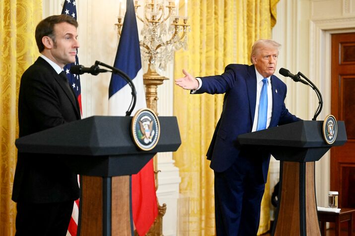 US President Donald Trump, right, and Emmanuel Macron in Washington, DC, in February 2025.