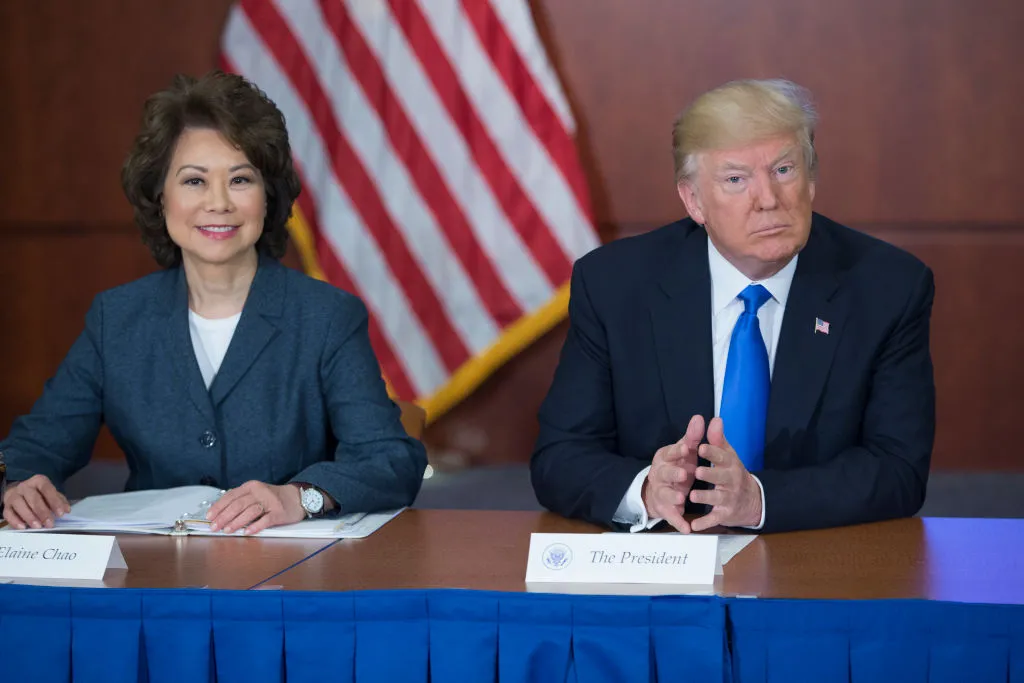 The secretary of transportation and president in June 2017, before he started insulting her.
