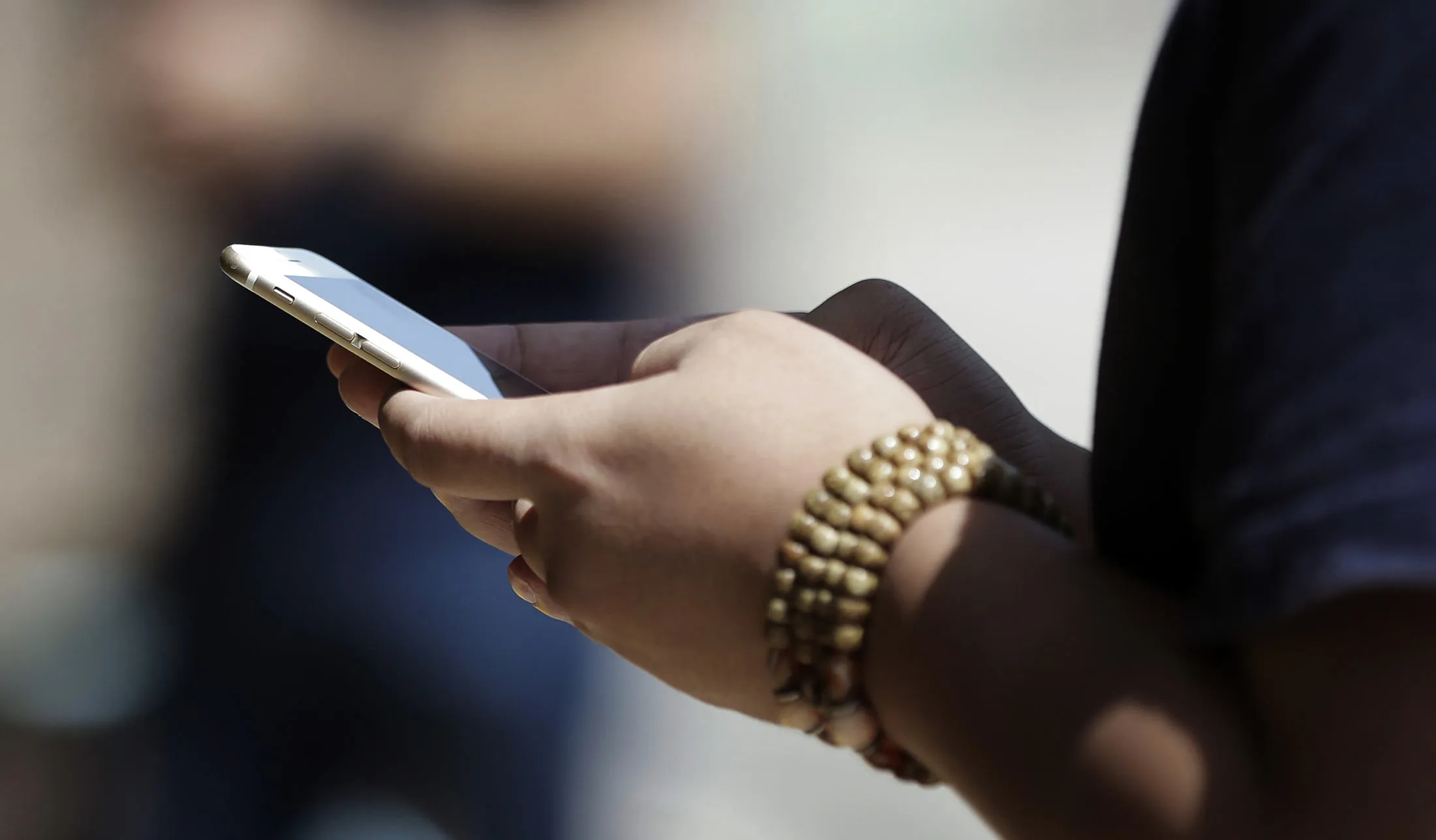 Mobile Phone Users And Stores As NTT DoCoMo Inc. Leads Plunge After Abe Calls For Lower Phone Bills