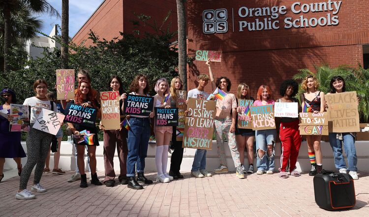 Students hold a rally outside an Orange County school board meeting on May 24, 2022, in Orlando, Florida, to protest book bans and the Florida Parents Rights in Education Act.