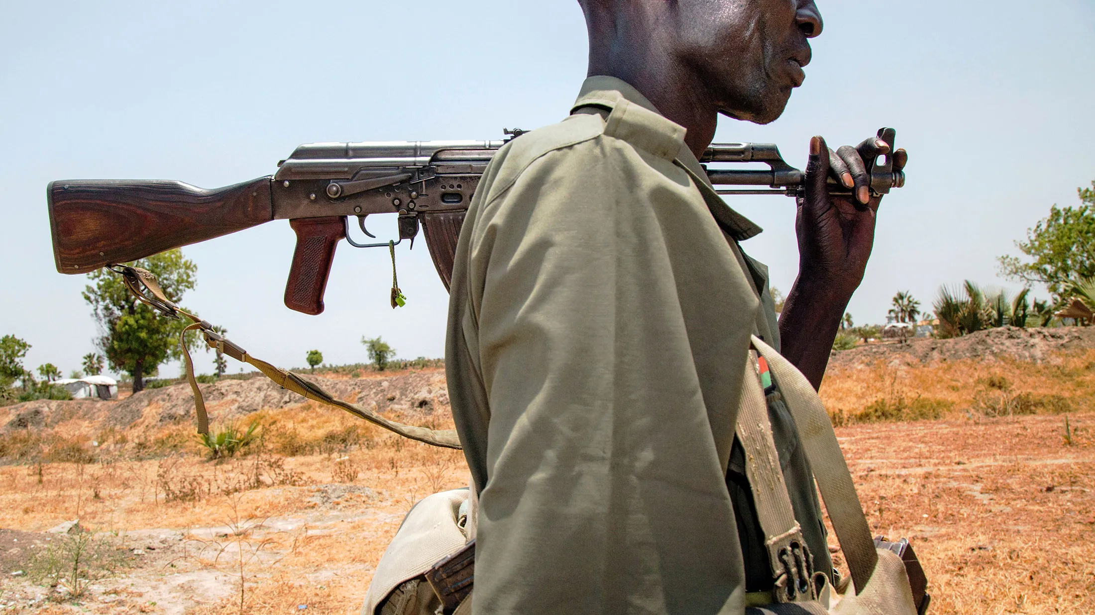 TOPSHOT - A member of the opposition troops walks near his base in Thonyor, in Leer county, on April 11, 2017. At least 16 civilians were killed in fighting on April 10, 2017, between government troops and rebels in South Sudan's second-largest city Wau, the United Nations peacekeeping mission (UNMISS) said in a statement. The violence stemmed from an ambush on April 11 of government troops near the city, leading to clashes in the city the following day, UNMISS said. / AFP PHOTO / ALBERT GONZALEZ FARRAN (Photo credit should read ALBERT GONZALEZ FARRAN/AFP/Getty Images)
