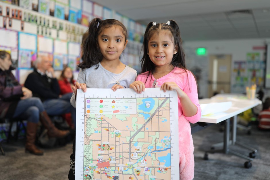 Boulder second-graders pose with an in-progress draft of the Growing Up Boulder map.