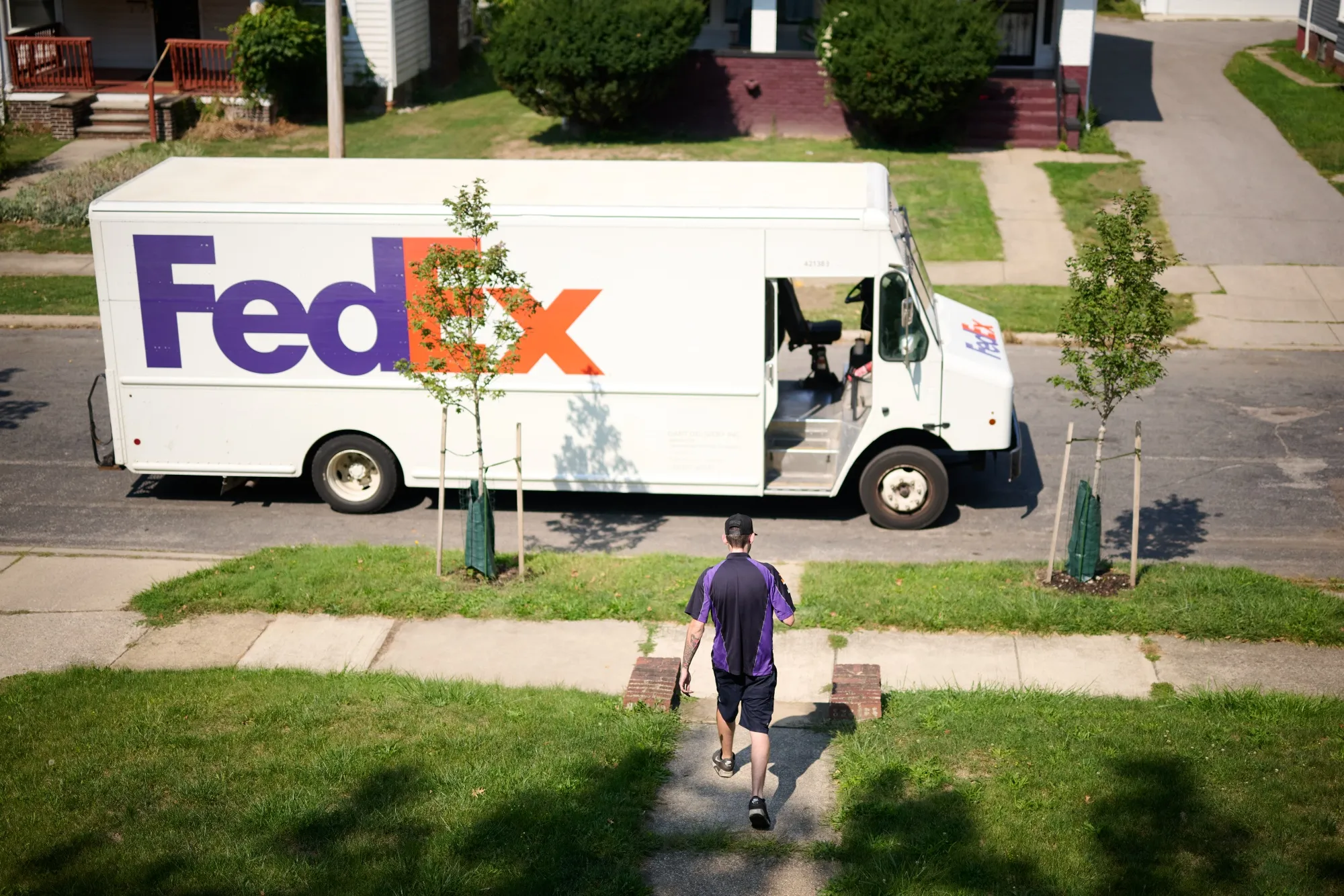 UPS, FedEx Take Hit as Americans Switch to Cheap Shipping - Bloomberg