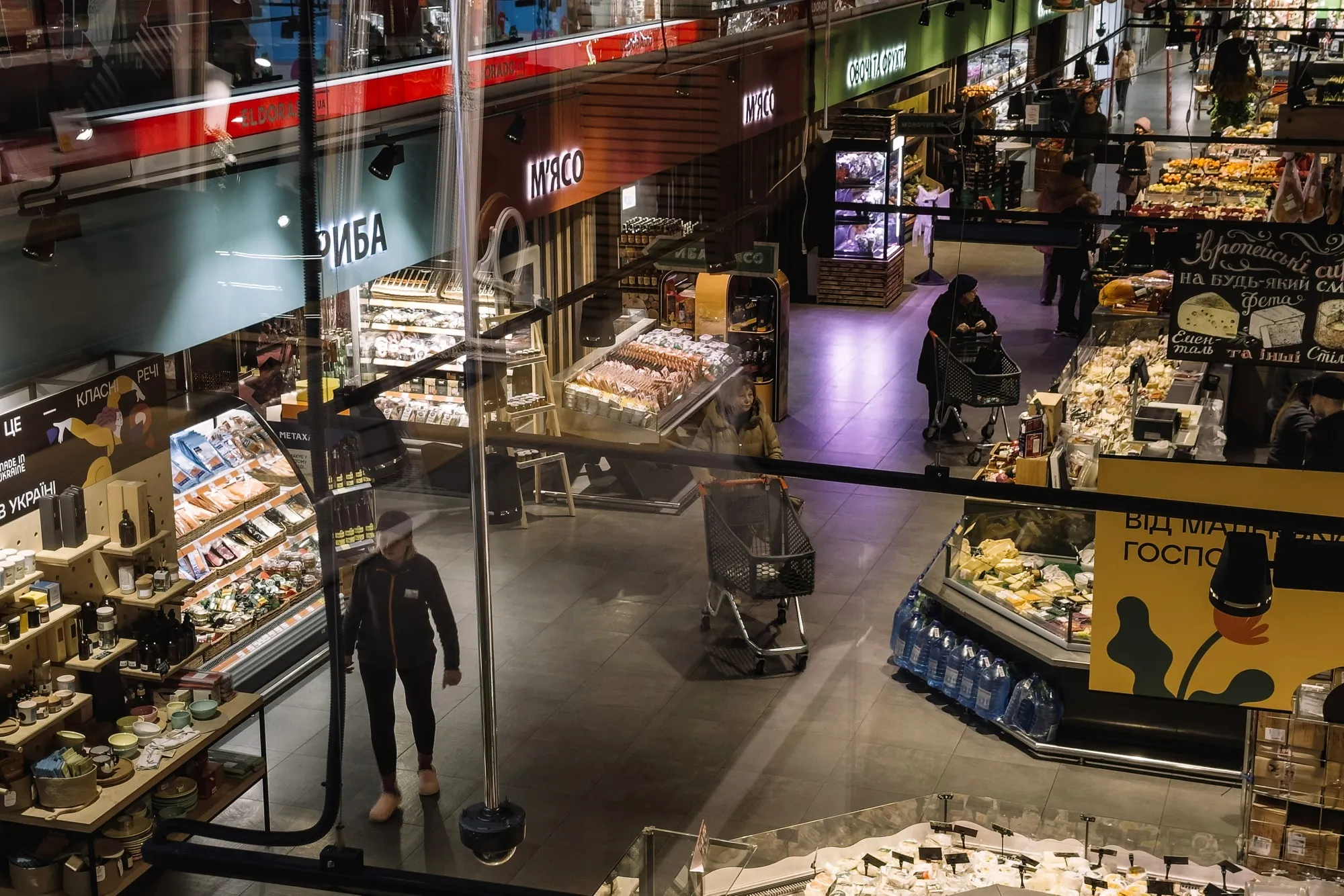 Shoppers at a market in Kyiv on Dec. 19.