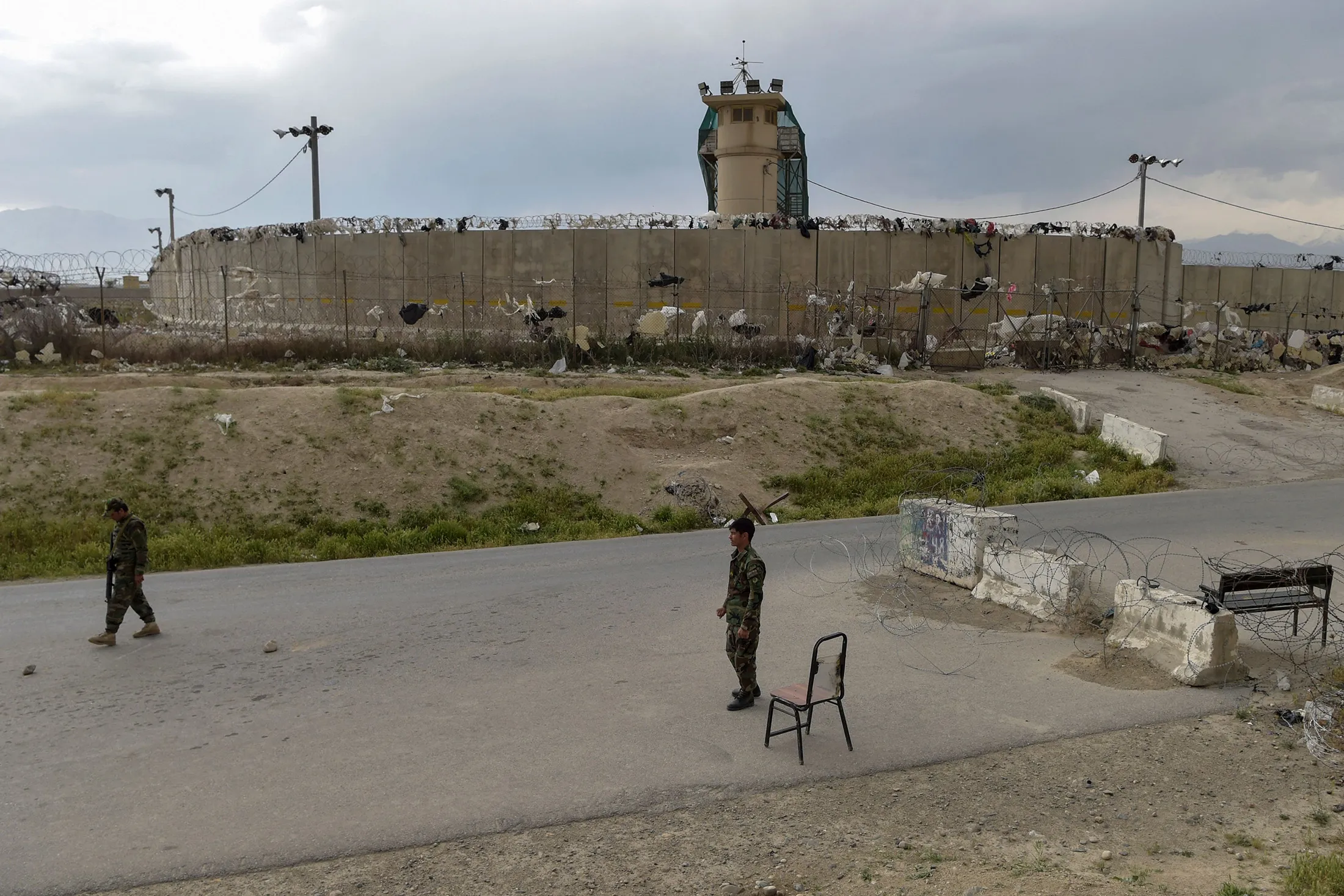 Afghan National Army&nbsp;soldiers stand guard at a checkpoint outside a U.S. military base in Bagram&nbsp;on April 29, 2021.